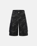 Dark camo cargo pants by INFLATION, featuring multiple pockets and a relaxed fit, perfect for streetwear style.
