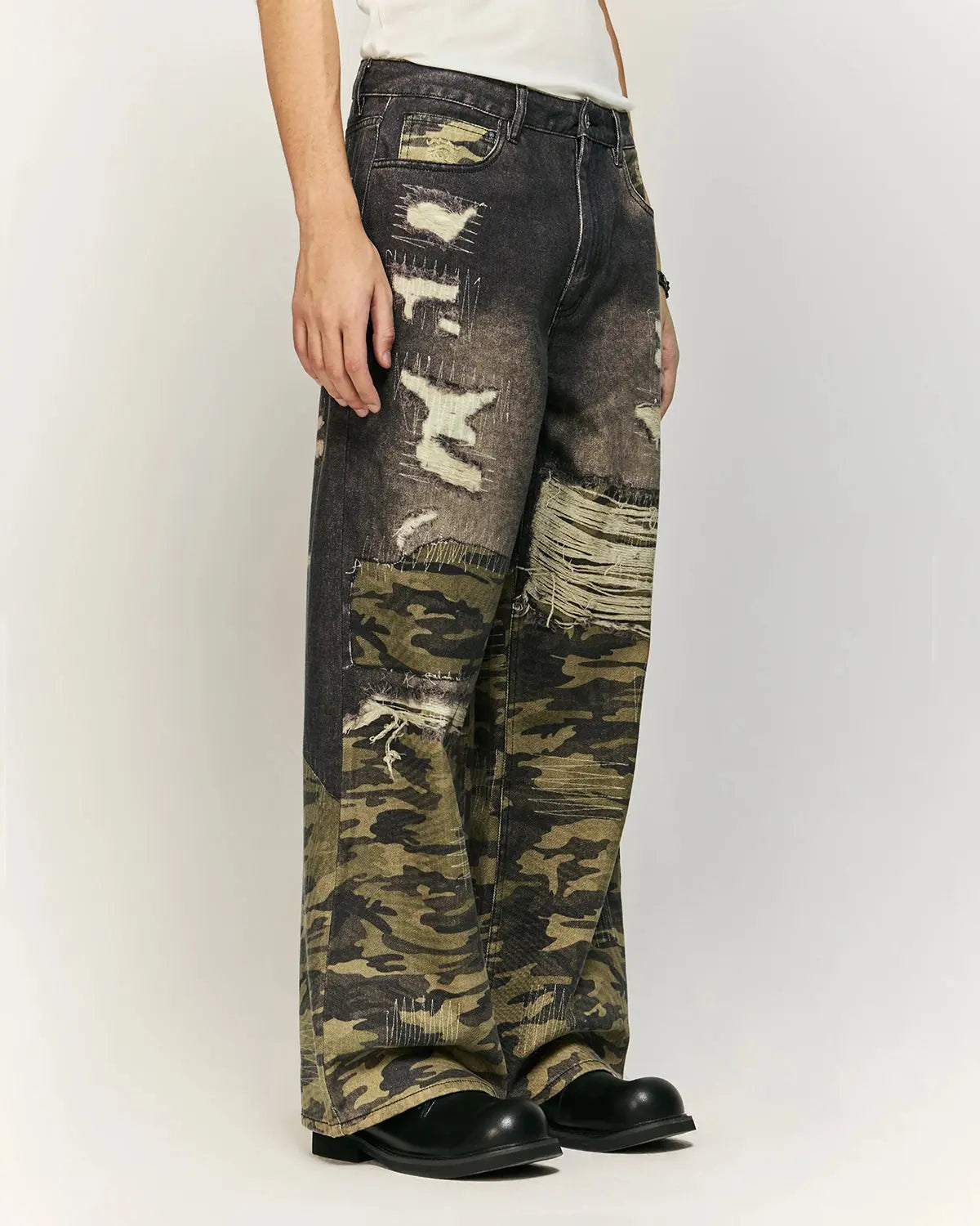 Camo digital printing baggy jeans by INFLATION featuring a relaxed fit and streetwear style with camouflage pattern.