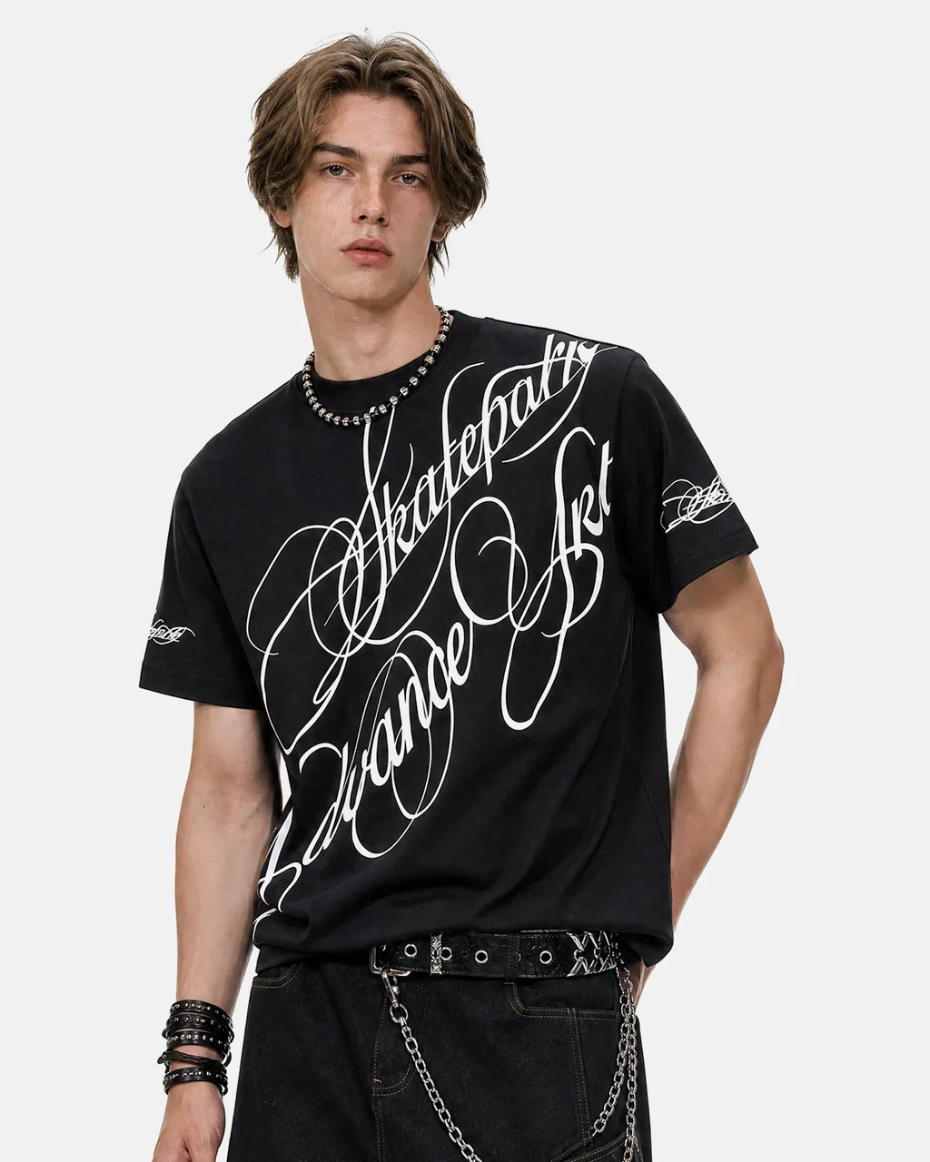 Inflation Streetwear All-Over Script Graphic T-Shirt featuring bold printed script design on a casual black T-shirt.