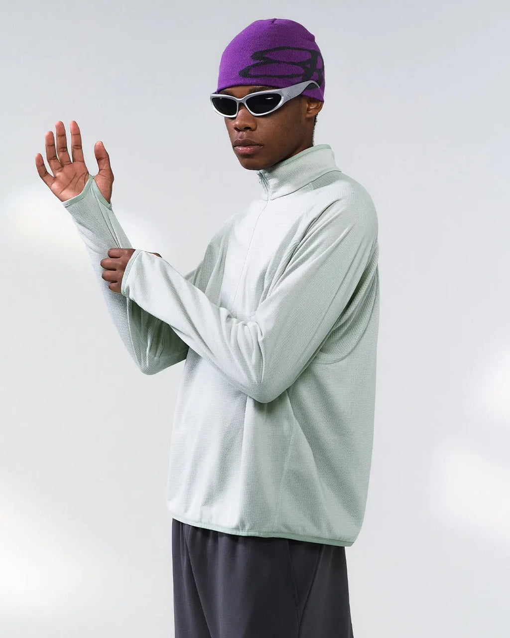 Inflation Streetwear breathable grid fleece half-zip sweatshirt with a relaxed fit and stylish design, shown in a close-up view.