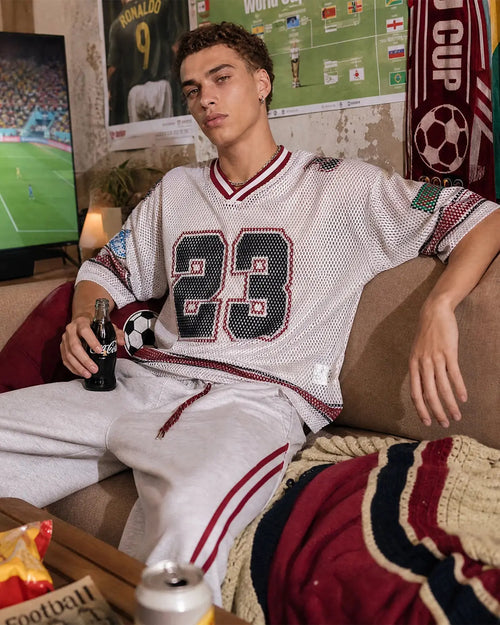 Inflation Streetwear 23 Jersey Mesh Print Tee featuring a vibrant printed design and breathable fabric, casual streetwear style.