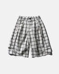 Inflation streetwear plaid longline casual shorts with a relaxed fit, featuring a checkered pattern and waistband detail.