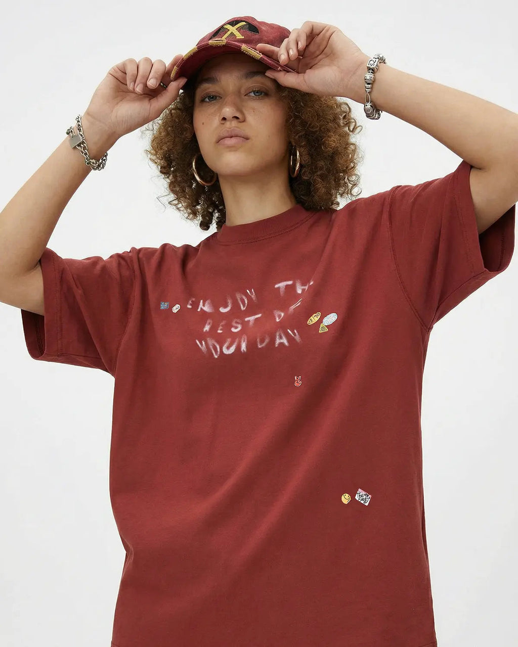 Vintage sticker graphic oversized T-shirt by INFLATION featuring bold, colorful streetwear design with a relaxed fit.