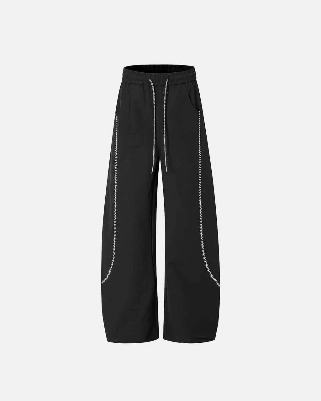 INFLATION AirFlow Contrast Embroidered Track Pants showing black fabric with colorful embroidered design and tapered fit.