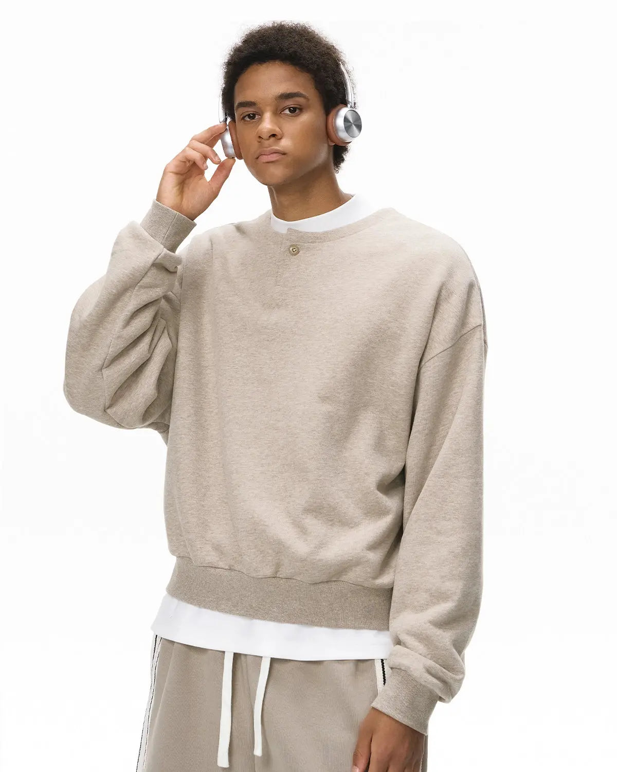 Inflation Streetwear boxy fit henley collar sweatshirt in neutral color, casual long-sleeve with buttoned placket and relaxed style.