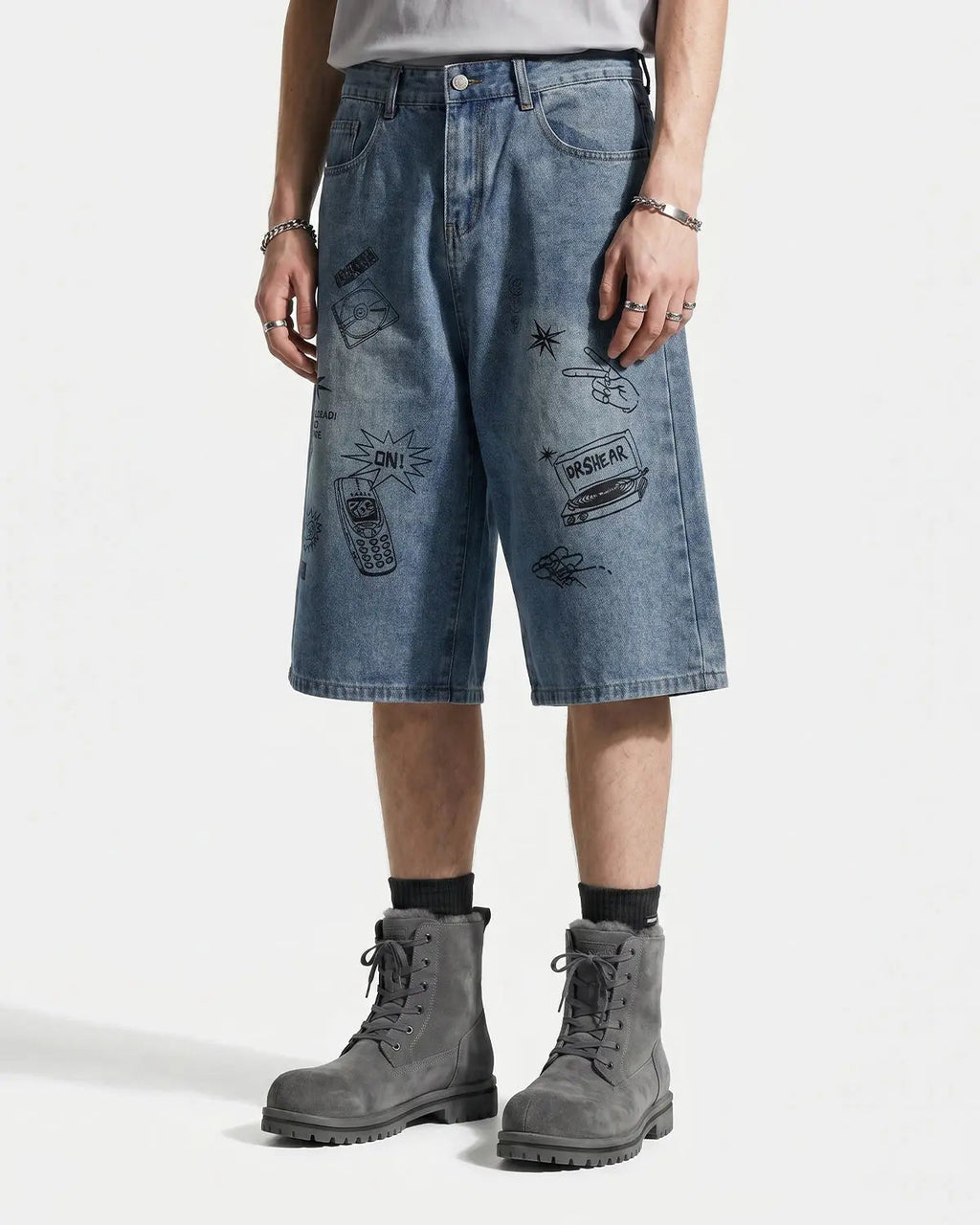 Washed graffiti longline jorts by Inflation Streetwear, casual denim pants with a distressed, artistic design and longline fit.