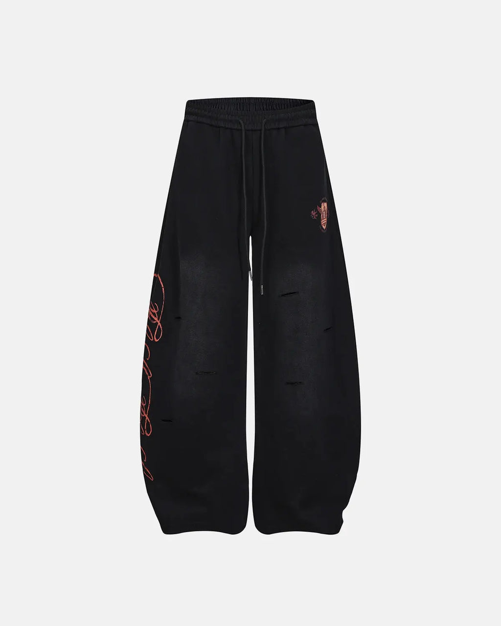 Vintage Washed Barrel Sweatpants by INFLATION, showing relaxed fit with washed denim texture and adjustable drawstring waist.