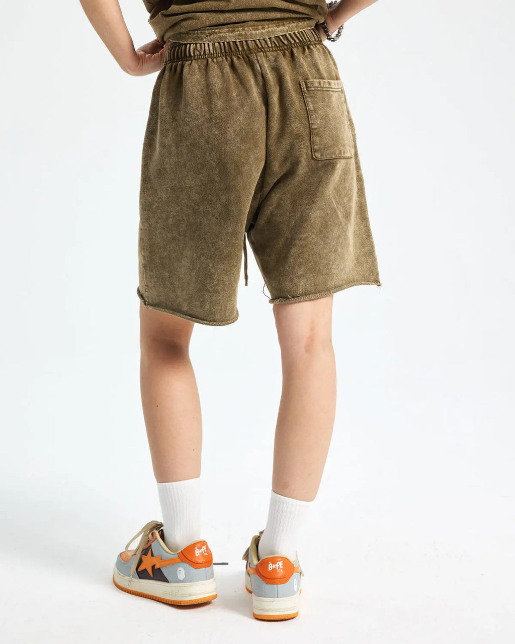 Inflation Heavyweight Washed Sweat Shorts, relaxed fit casual pants with a distressed wash, lying flat on a neutral background.