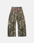 Pink embroidered camo baggy pants by INFLATION with camouflage pattern and relaxed fit, detailed embroidery on the fabric.
