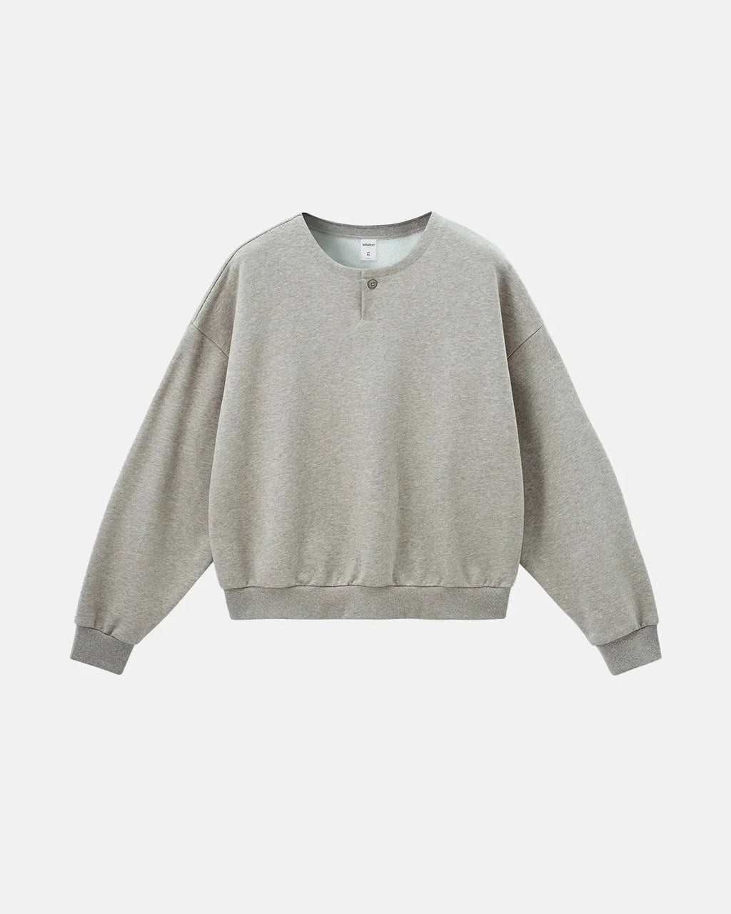 Boxy fit Henley collar sweatshirt by INFLATION Streetwear, featuring a relaxed fit and classic design in neutral fabric.