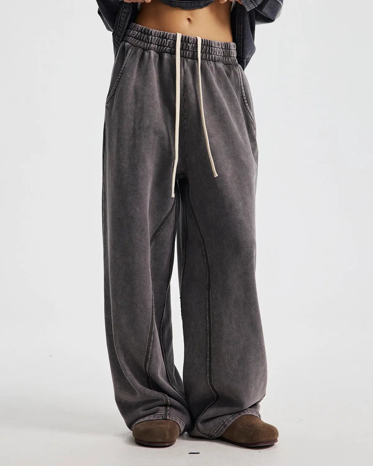 Inflation Streetwear straight leg acid wash sweatpants with relaxed fit and casual style, shown on a model.