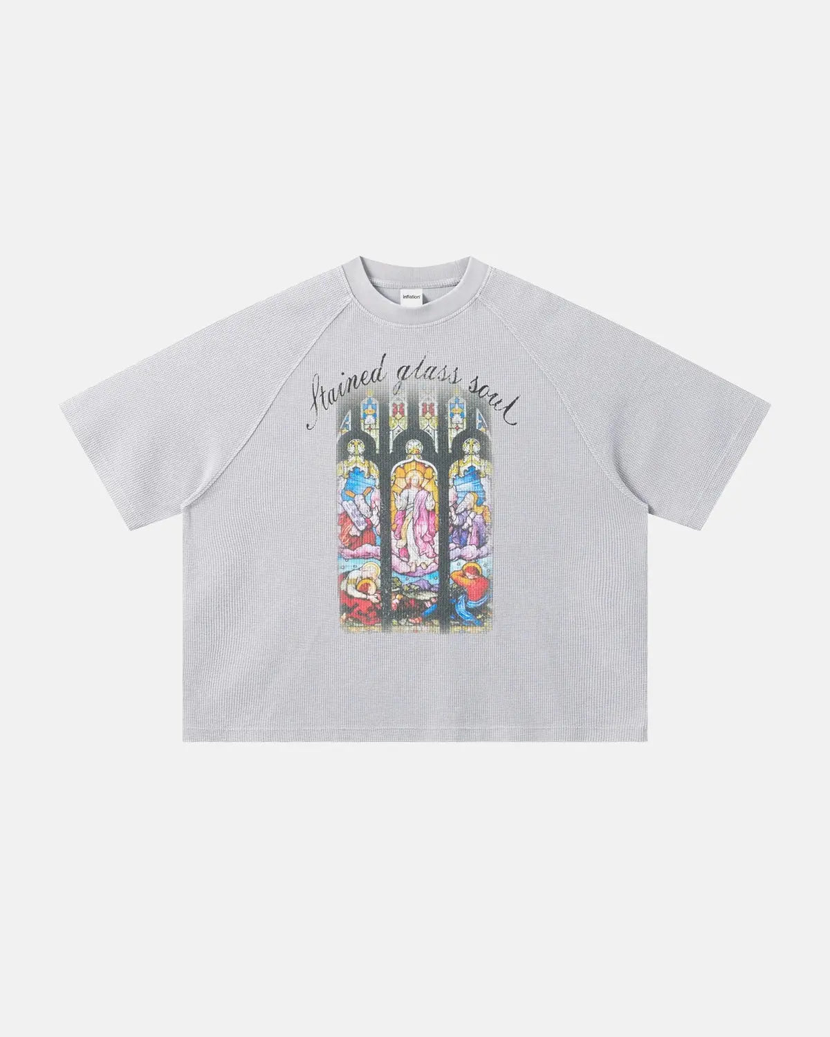 Inflation Streetwear washed graphic boxy waffle T-shirt with bold print, casual fit, and soft fabric, displayed on a hanger.