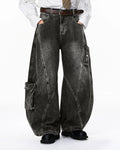 Distressed washed cargo barrel jeans by INFLATION featuring a relaxed fit and streetwear style, shown in a front view.