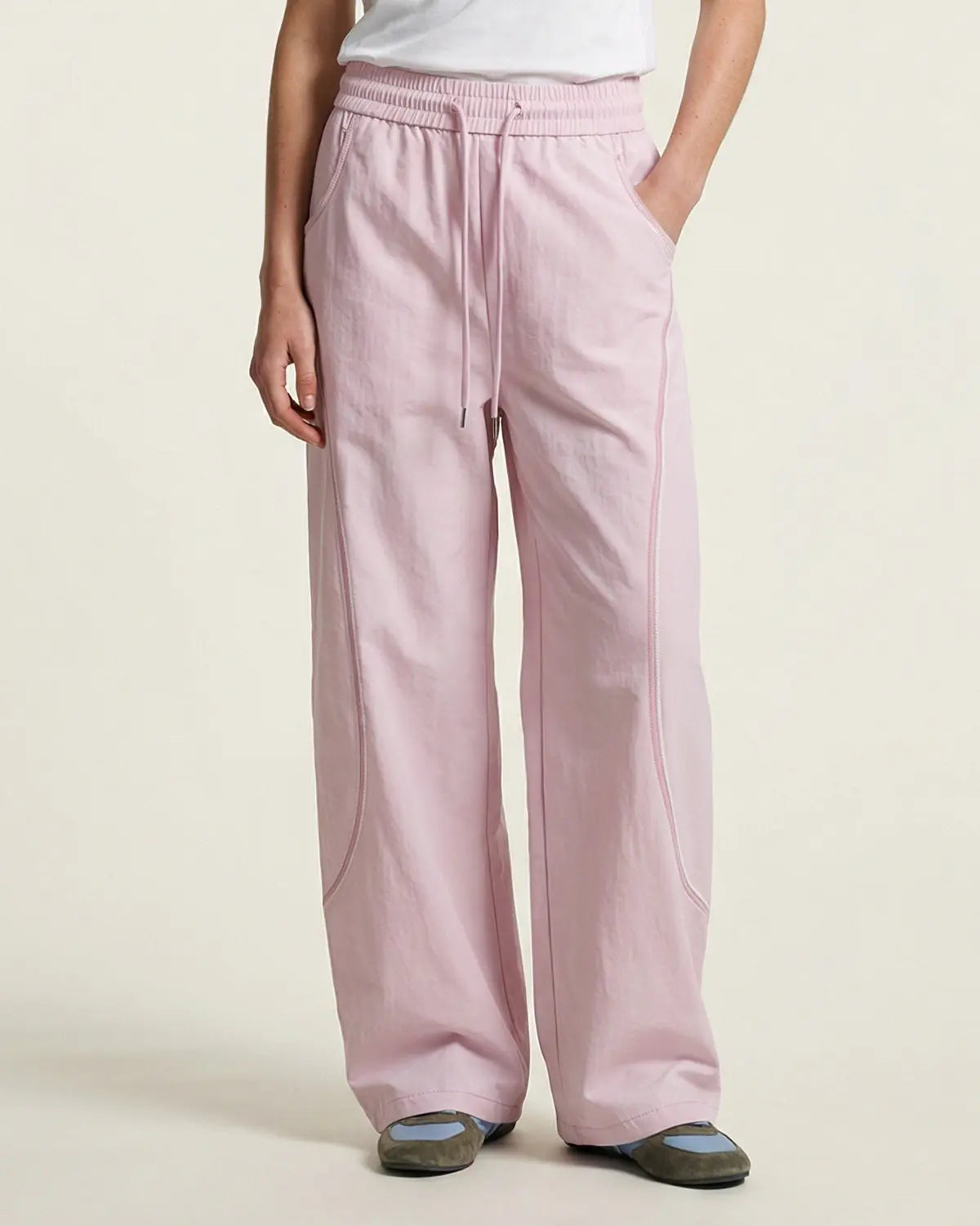 INFLATION AirFlow Contrast Embroidered Track Pants with breathable design and stylish embroidery, made for comfortable active wear.