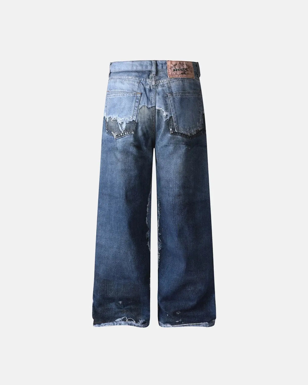 Distressed baggy jeans by INFLATION featuring a digital print design, relaxed fit, and trendy streetwear style.