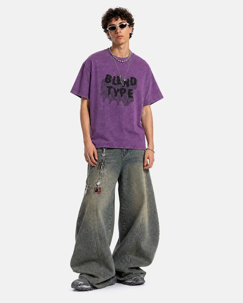 Purple washed oversized graphic T-shirt by INFLATION Streetwear, featuring bold printed designs on soft cotton fabric.