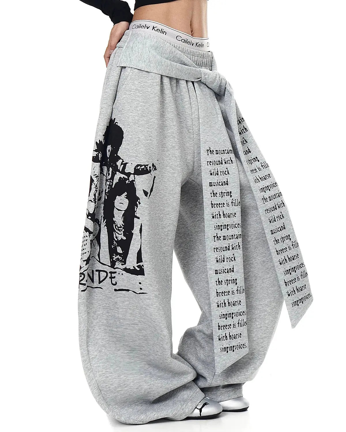 Inflation Streetwear graphic printing baggy sweatpants with bold design, relaxed fit, and comfortable fabric, shown on a model.