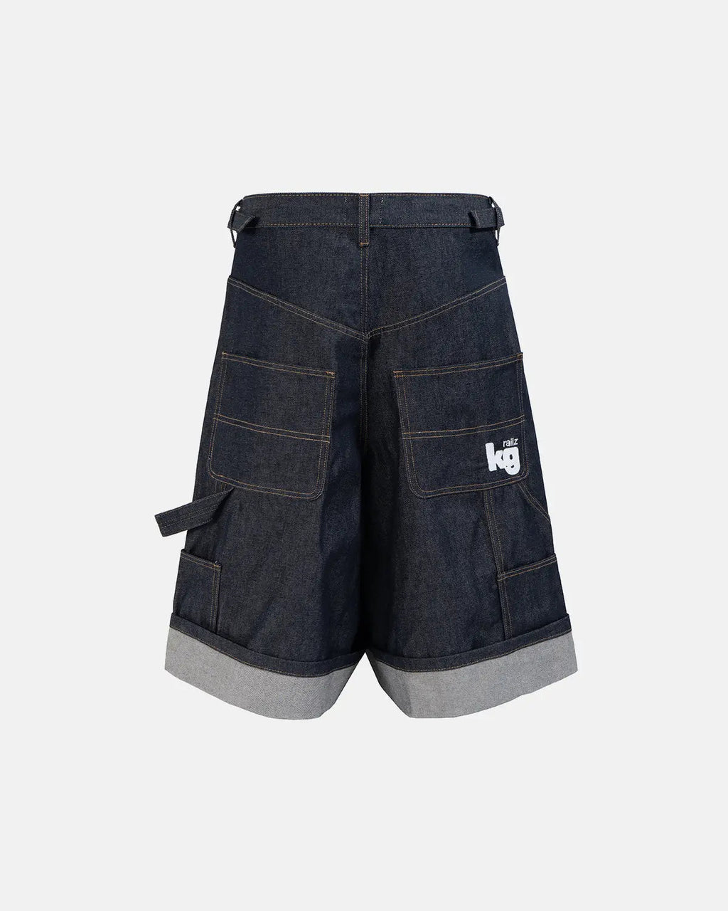 Raw denim carpenter long jorts by INFLATION, featuring distressed details and practical pockets, styled as streetwear pants.