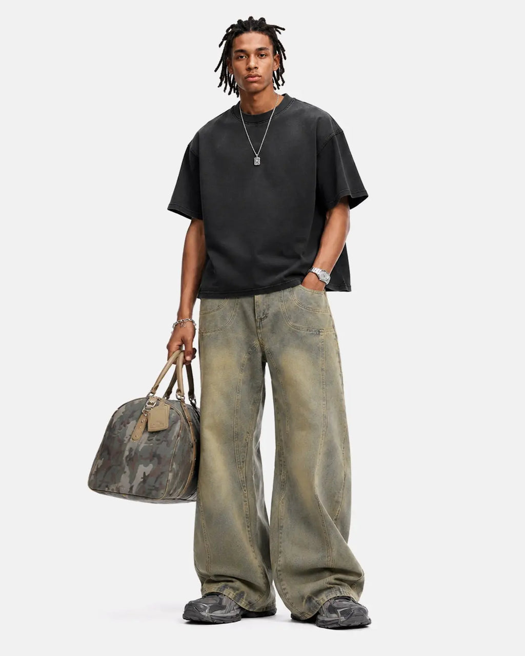 Inflation Streetwear curved panel straight-leg jeans showing fit and design details in dark denim fabric.
