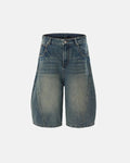 Inflation Scimitar Denim Baggy Jorts pants with a relaxed fit and distressed denim style, featuring a casual streetwear look.