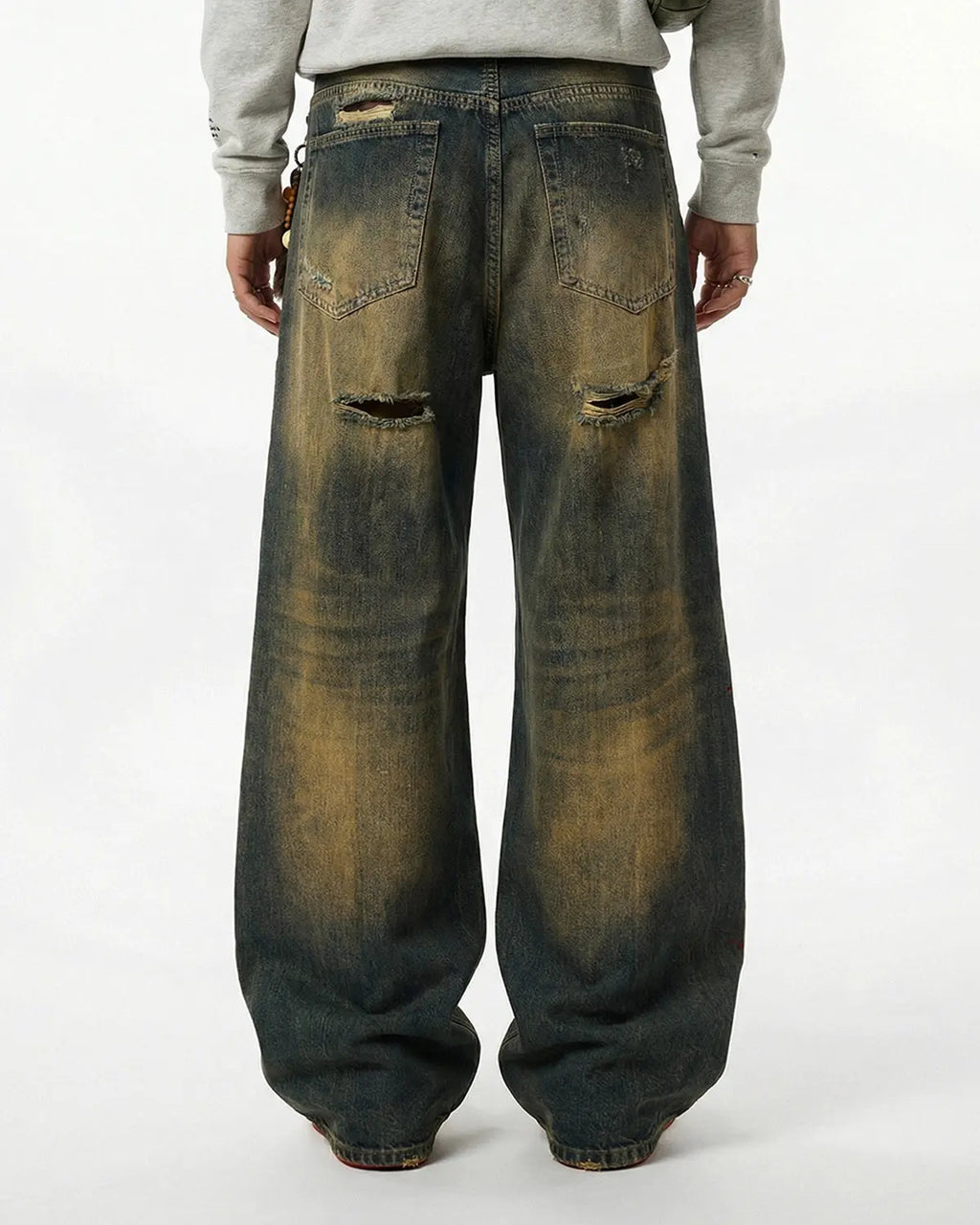 Inflation Dirty Wash Rhinestone Baggy Jeans featuring distressed denim and sparkling rhinestone details in a relaxed streetwear style.