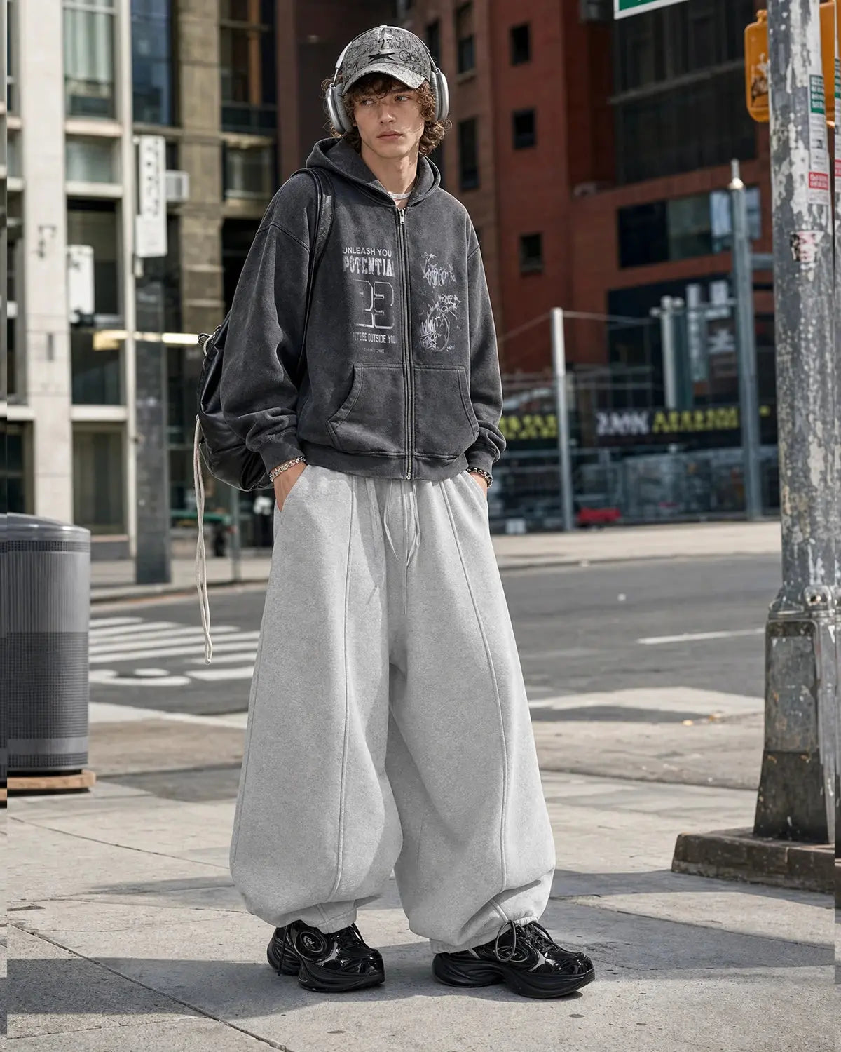 Grey baggy jogger sweatpants by Inflation Streetwear, featuring a relaxed fit and comfortable casual style.