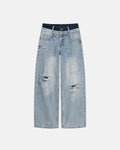 Distressed baggy jeans with double waist design by Inflation Streetwear, featuring a relaxed fit and distressed detailing.