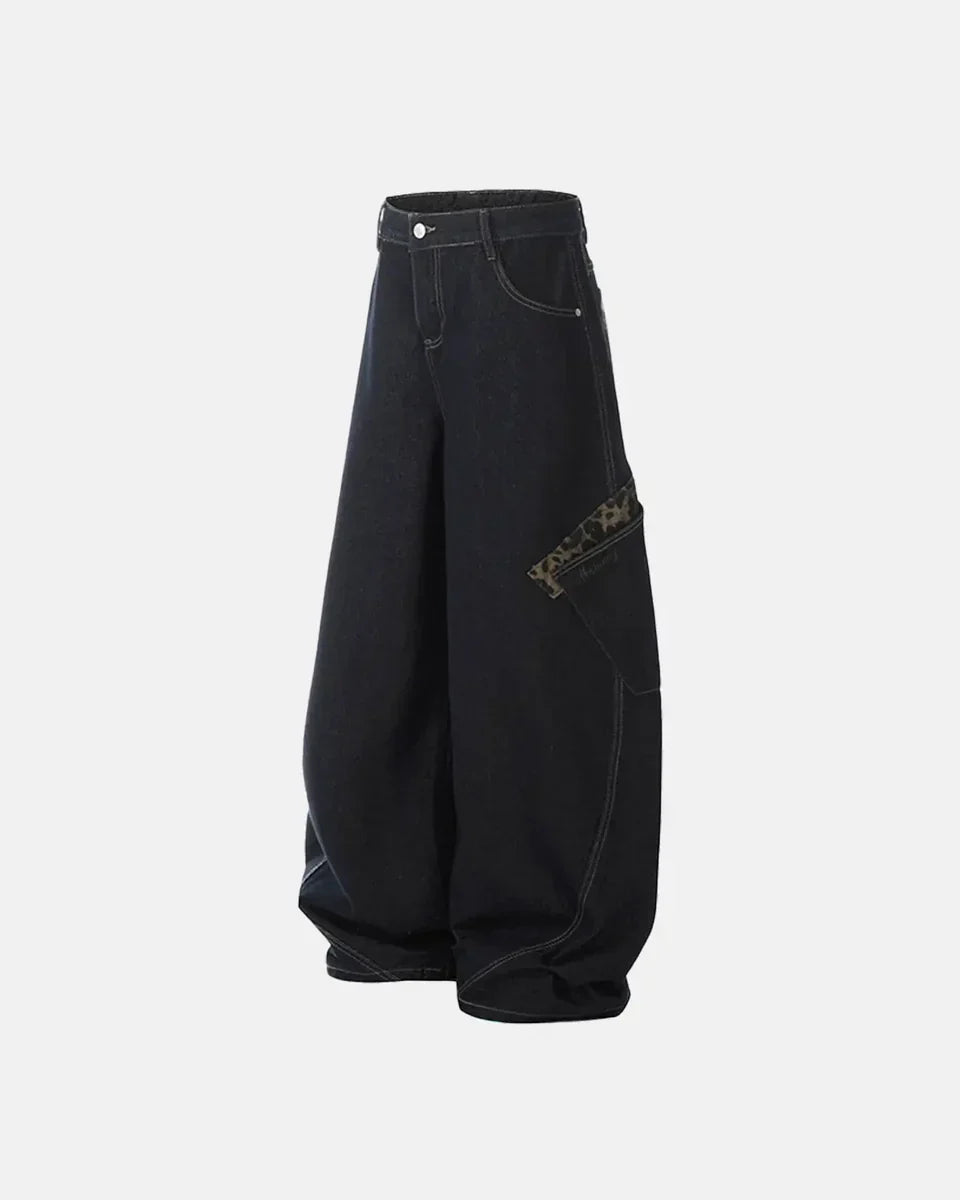 Leopard patchwork barrel jeans by INFLATION featuring unique animal print and relaxed fit, stylish streetwear for casual wear.