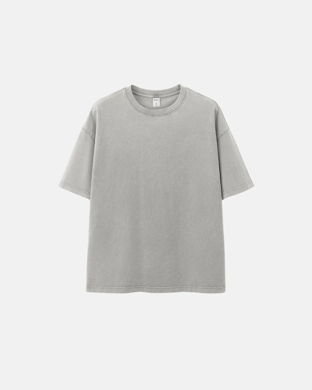 Heavyweight oversized washed T-shirt by INFLATION, featuring a relaxed fit and vintage washed look, displayed on a hanger.