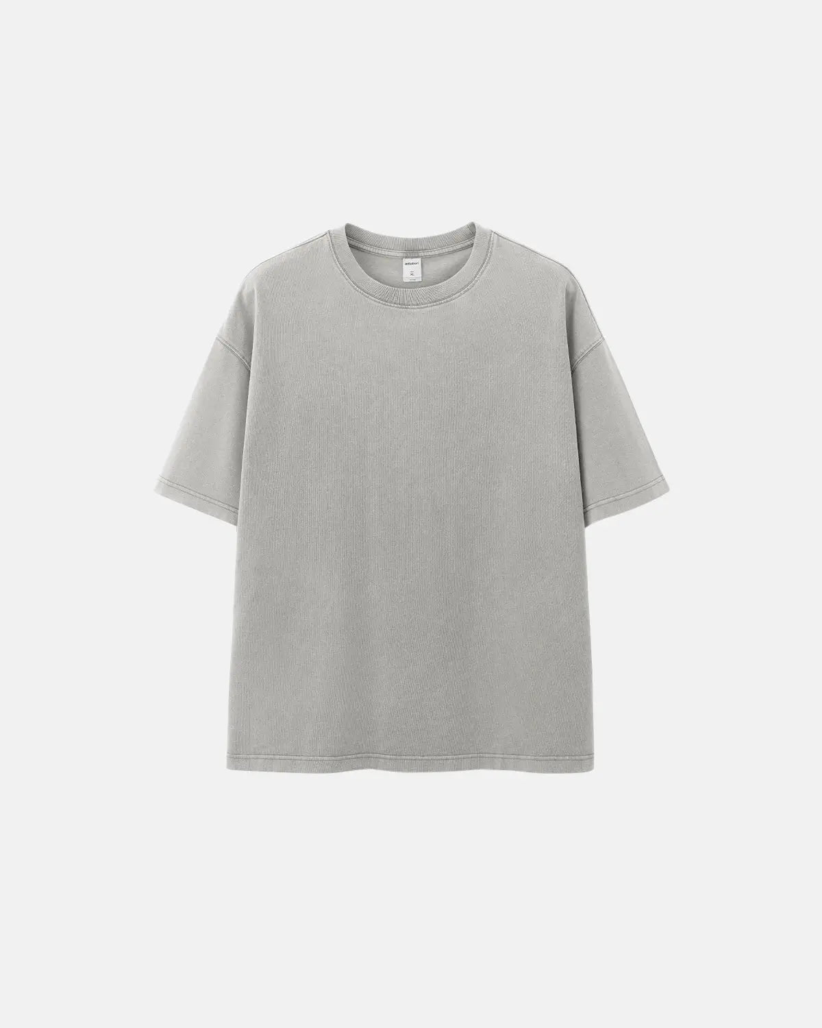 Heavyweight oversized washed T-shirt by INFLATION, featuring a relaxed fit and vintage washed look, displayed on a hanger.