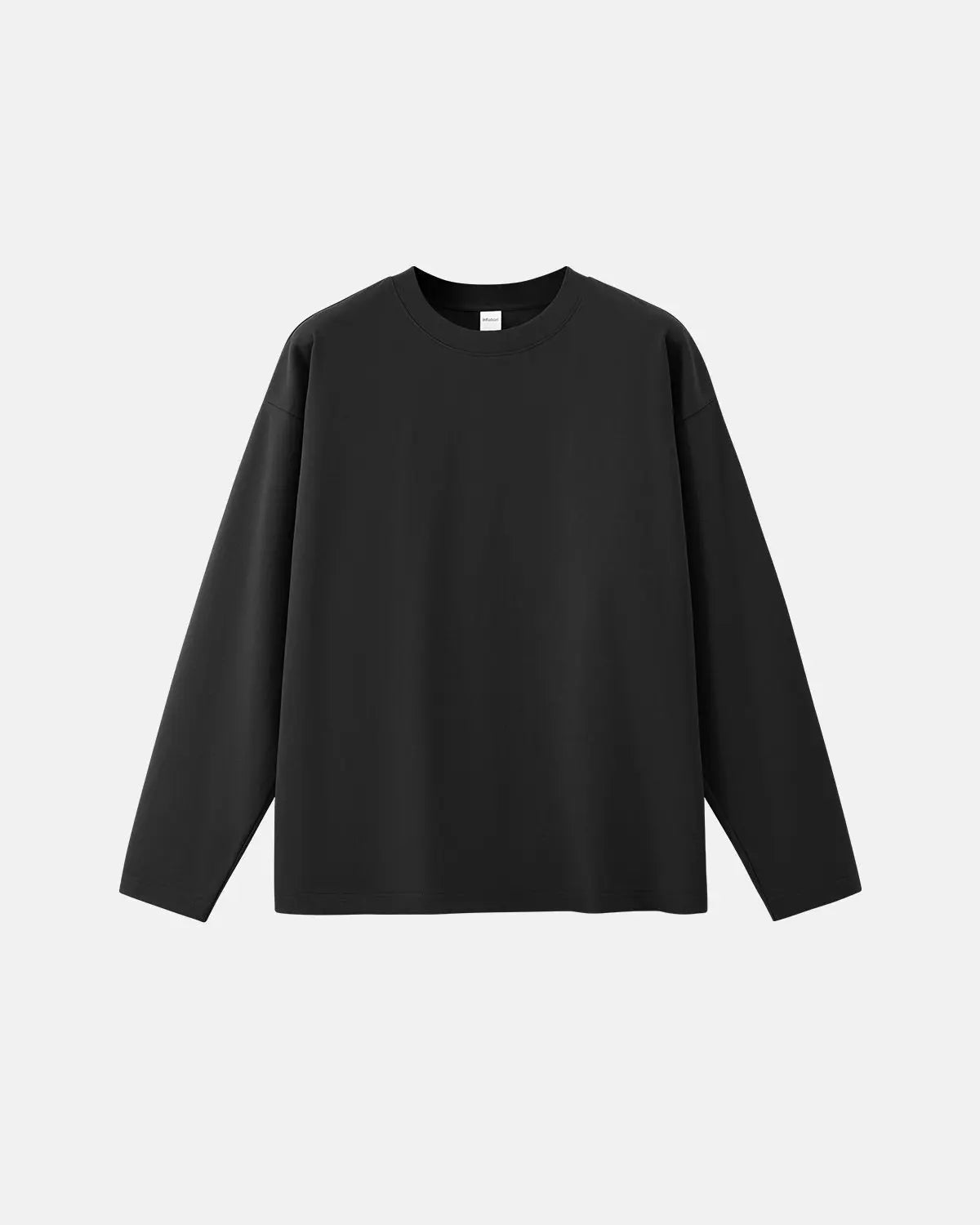 Plain white cotton long sleeve tee from INFLATION Streetwear, featuring a simple, classic crew neck and long sleeves.