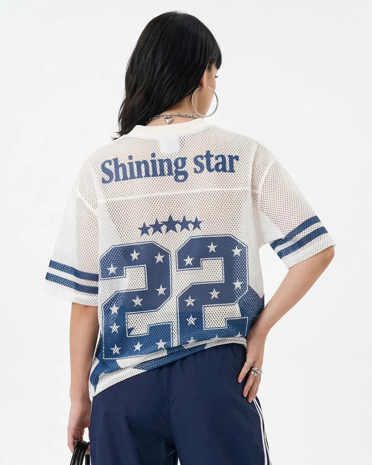 Inflation Star Graphic Oversized Mesh Jersey featuring bold star print, lightweight mesh fabric, and streetwear style.