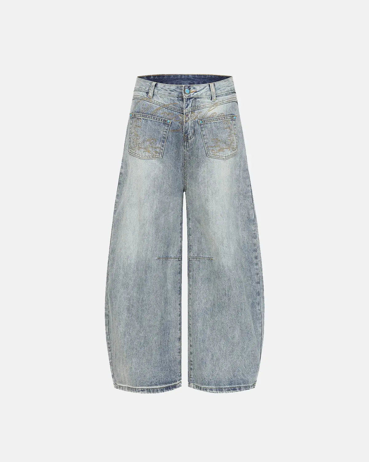 Graphic embroidered washed barrel jeans by INFLATION, showcasing distressed denim with colorful embroidery details and a relaxed fit.