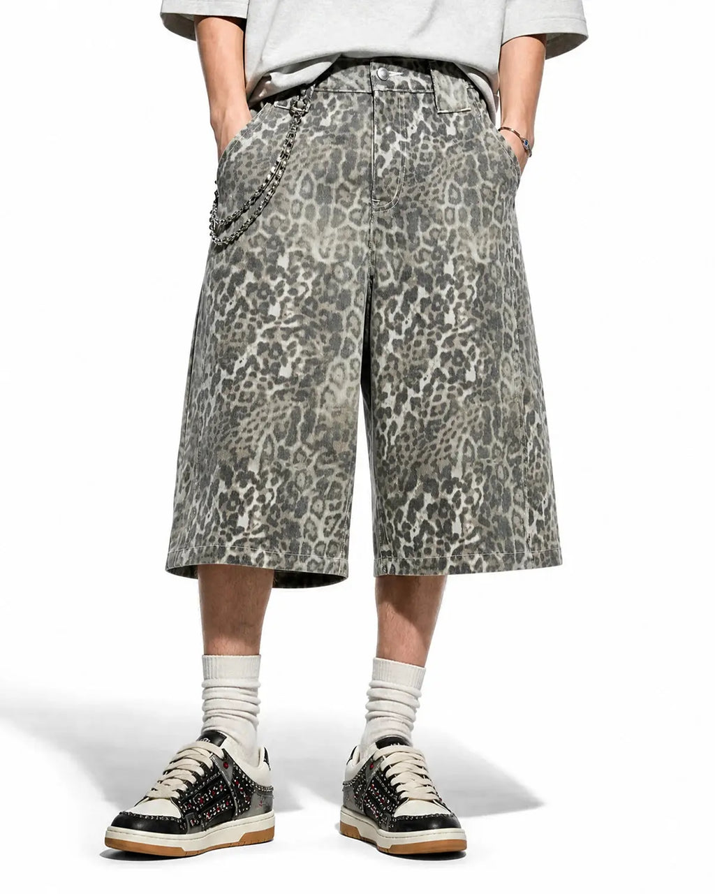 Leopard print baggy pants from Inflation Streetwear with a relaxed fit, featuring bold animal print fabric and casual style.