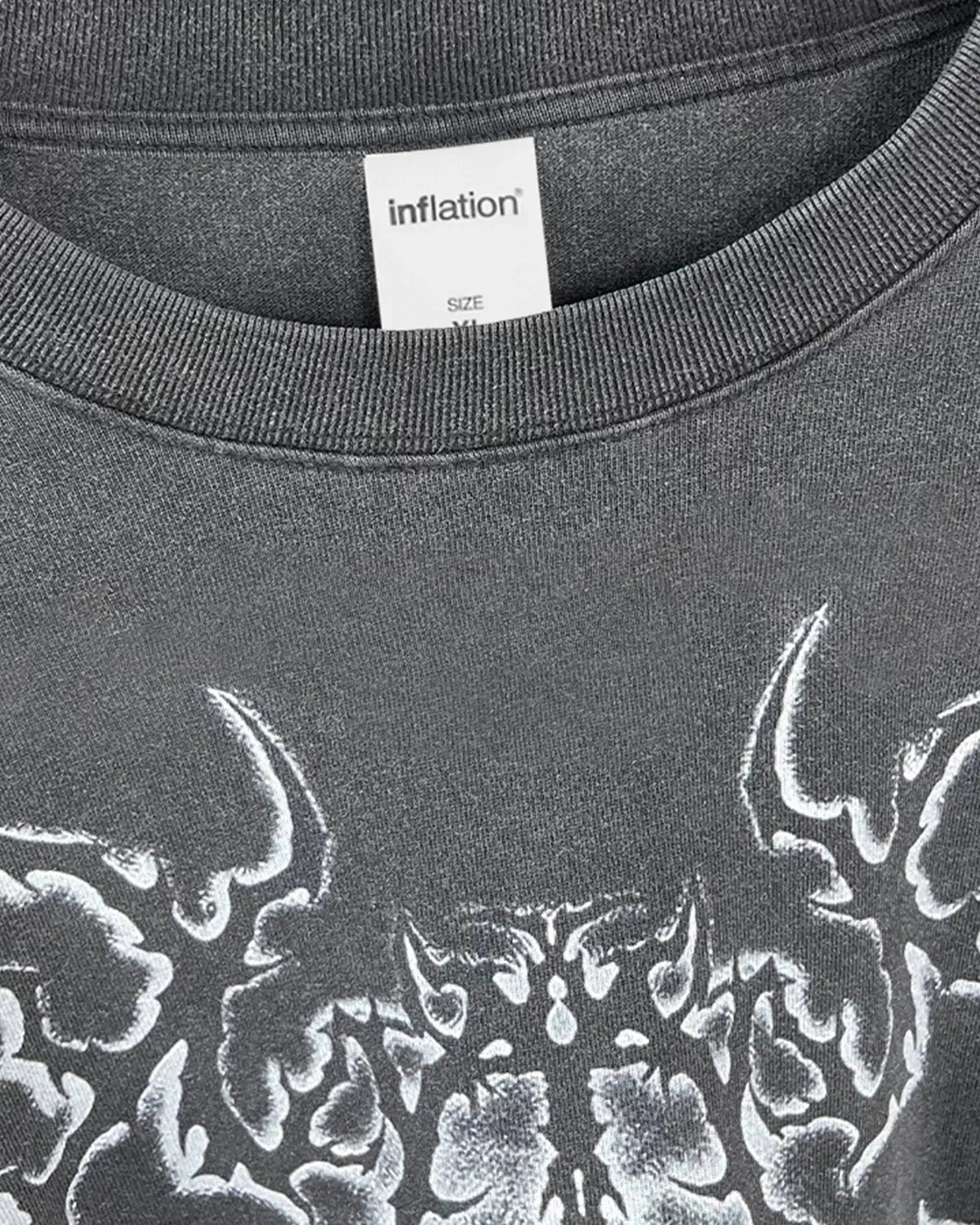 Inflation Streetwear Retro Raw Edge Graphic T-shirt with bold printed design and distressed edges, casual streetwear style.