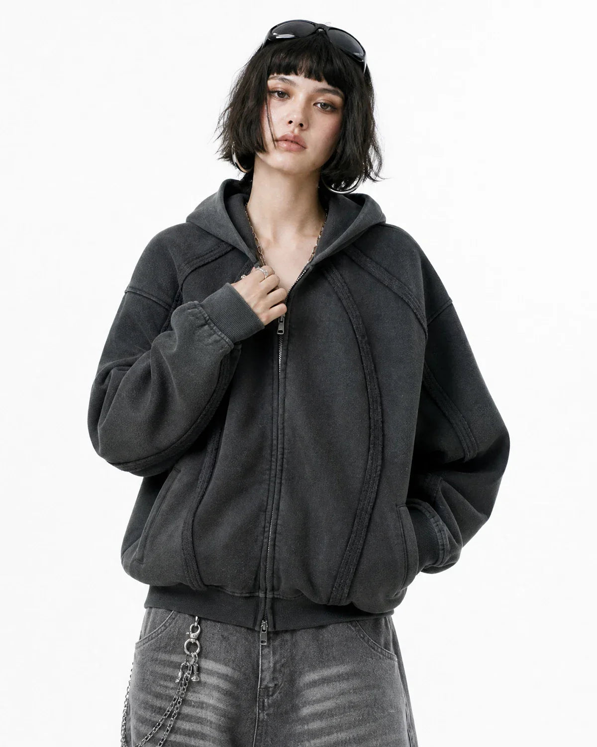 Inflation Streetwear snow washed raw edge boxy zip-up hoodie displayed on a hanger, showcasing the casual urban style.