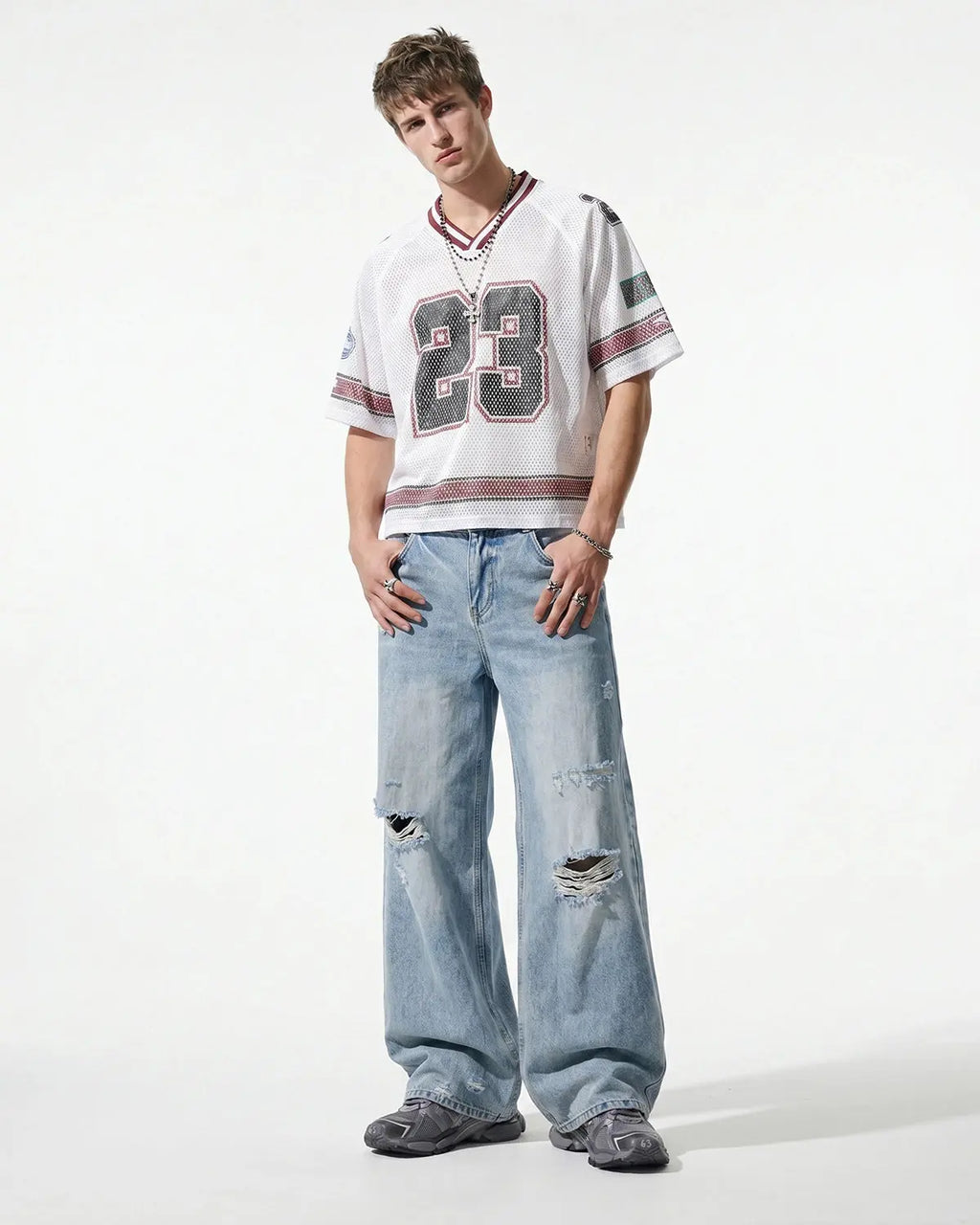 Inflation Double Waist Distressed Baggy Jeans with ripped details and relaxed fit, styled for streetwear fashion.