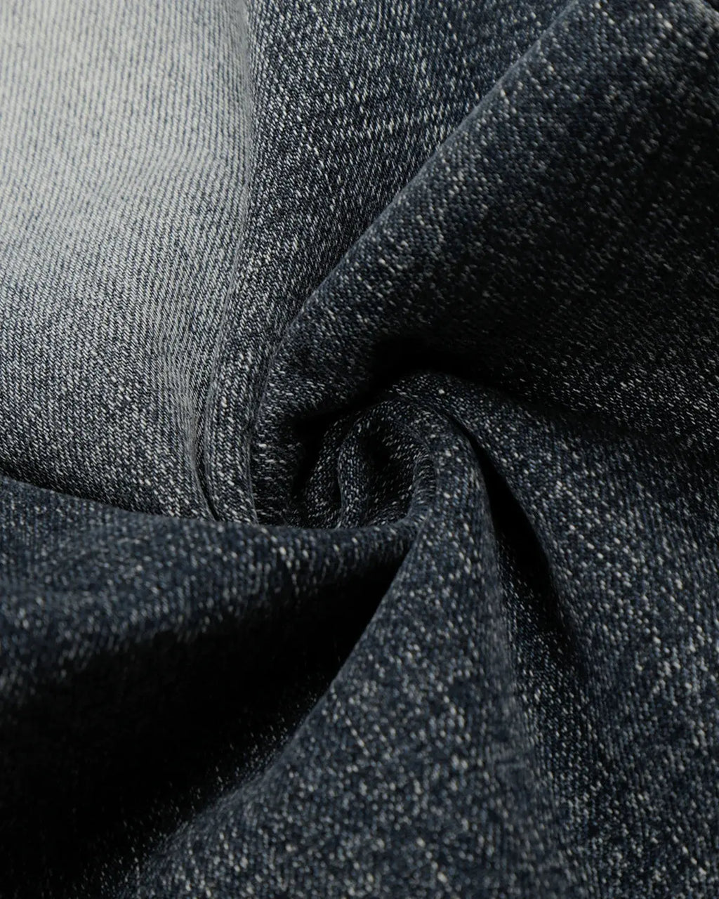 Light-wash faded Whisker Baggy Jeans by INFLATION featuring relaxed fit and distressed details on denim.