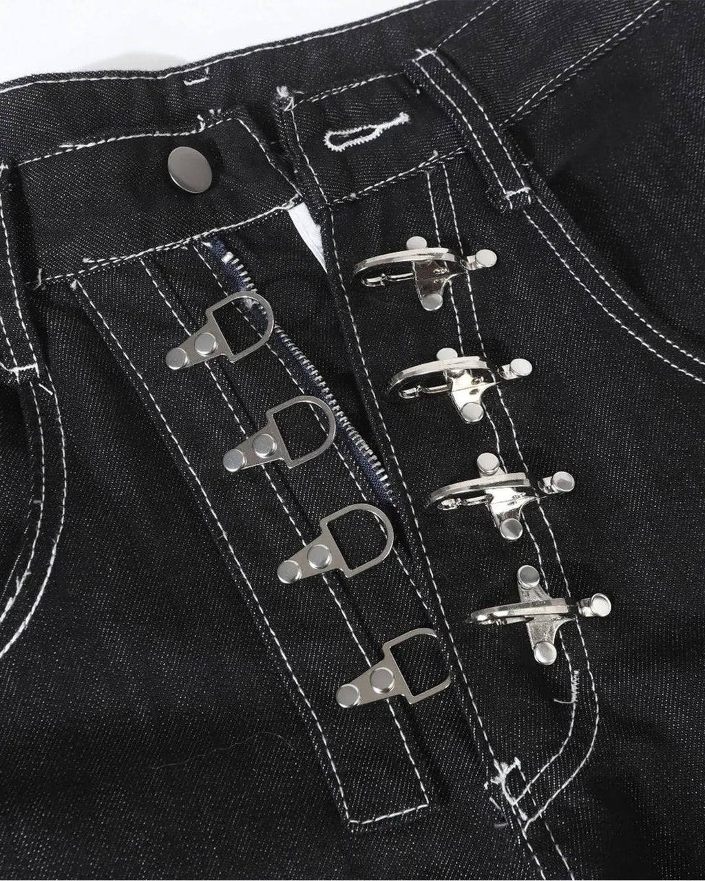Raw metal clasp baggy jeans from INFLATION Streetwear featuring a relaxed fit and distressed denim texture.