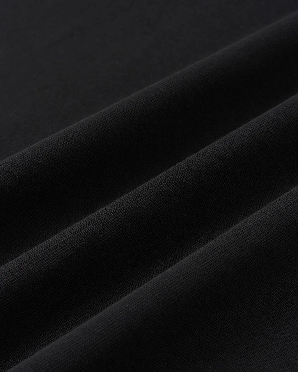 Inflation Streetwear Script Graphic Oversized T-Shirt in black with bold white lettering, casual streetwear style for men and women.