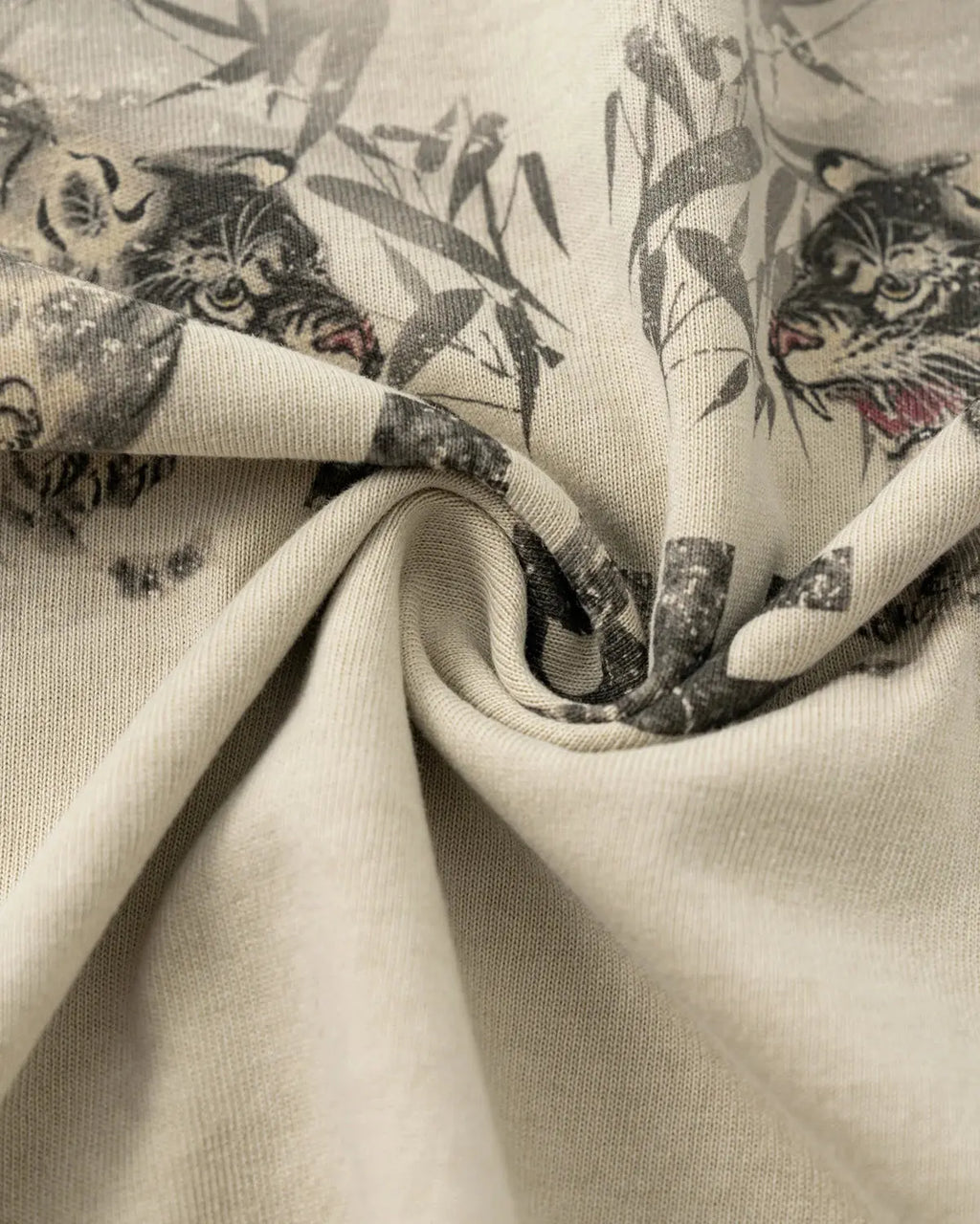 Vintage washed oversized graphic T-shirt by INFLATION, featuring distressed design and relaxed streetwear style.
