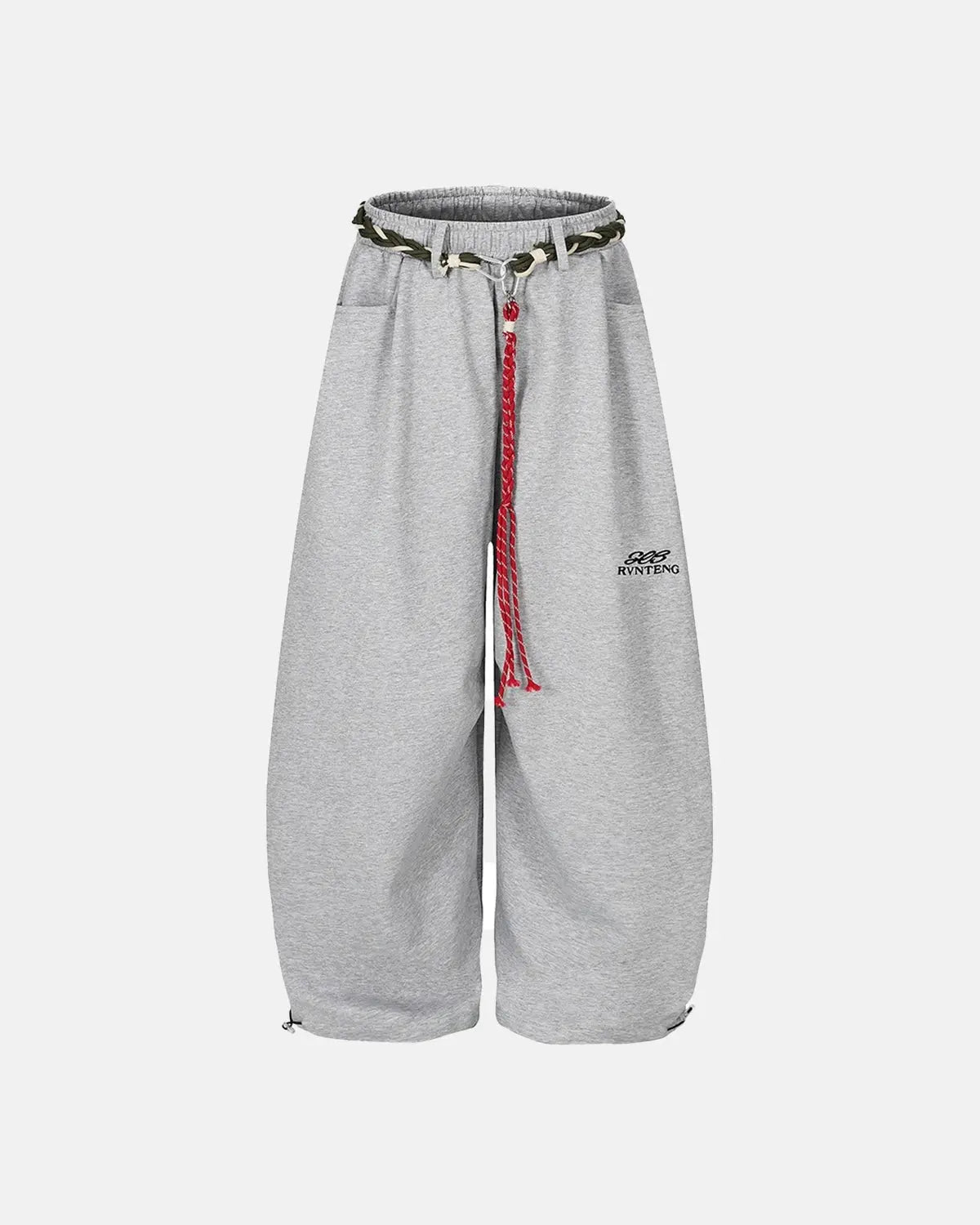 Baggy wide-leg sweatpants with waistband from INFLATION streetwear, showing relaxed fit and comfortable fabric in a casual setting.