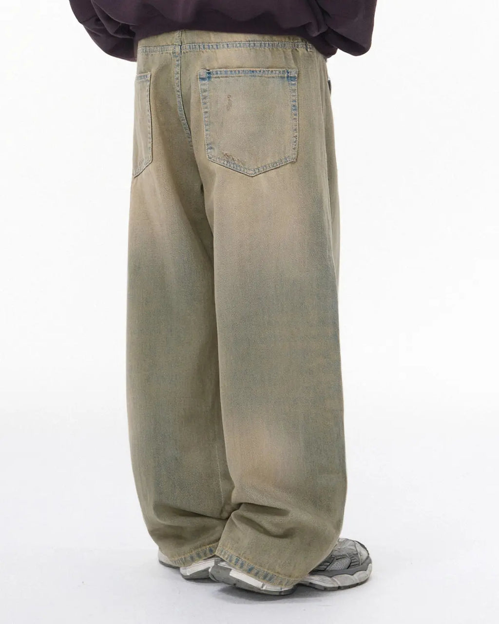 Beaded studded washed baggy jeans by INFLATION Streetwear featuring distressed denim and decorative bead and stud embellishments.