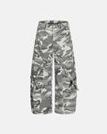 Camouflage cargo pants with multiple pockets by INFLATION, featuring a relaxed fit and streetwear style.