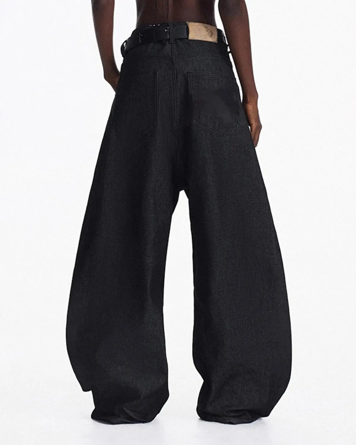 Inflation Streetwear heavyweight baggy raw wide-leg jeans, showing their relaxed fit, raw denim texture, and oversized style.