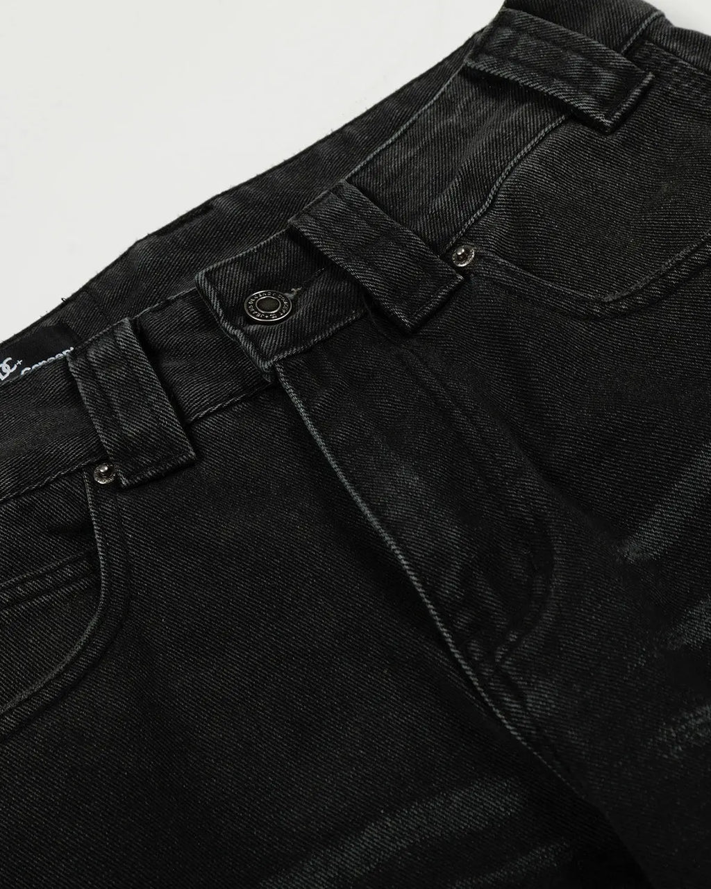 Black patchwork barrel jeans by Inflation Streetwear, featuring a relaxed fit with trendy patchwork details and sturdy denim fabric.