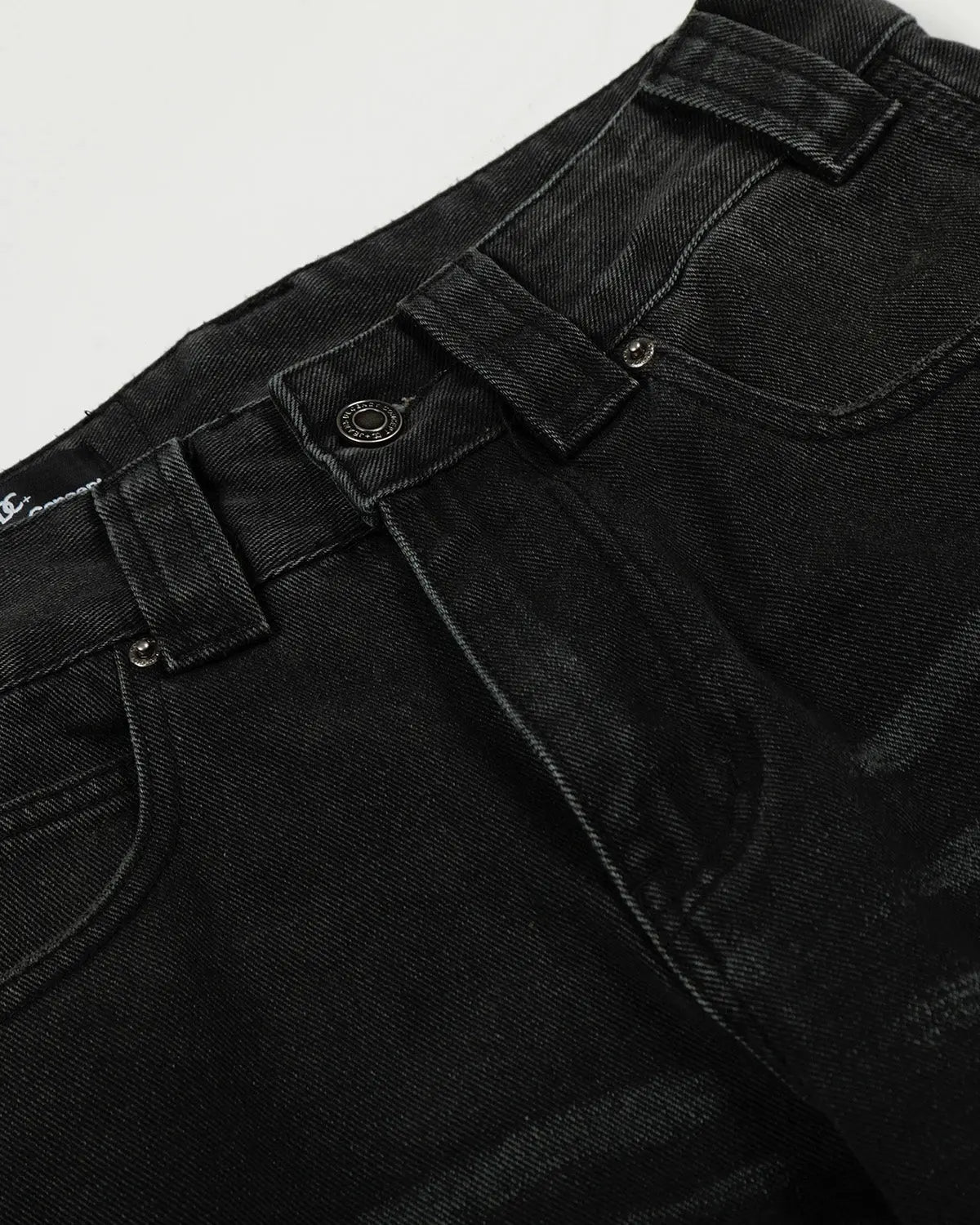 Black patchwork barrel jeans by Inflation Streetwear, featuring a relaxed fit with trendy patchwork details and sturdy denim fabric.