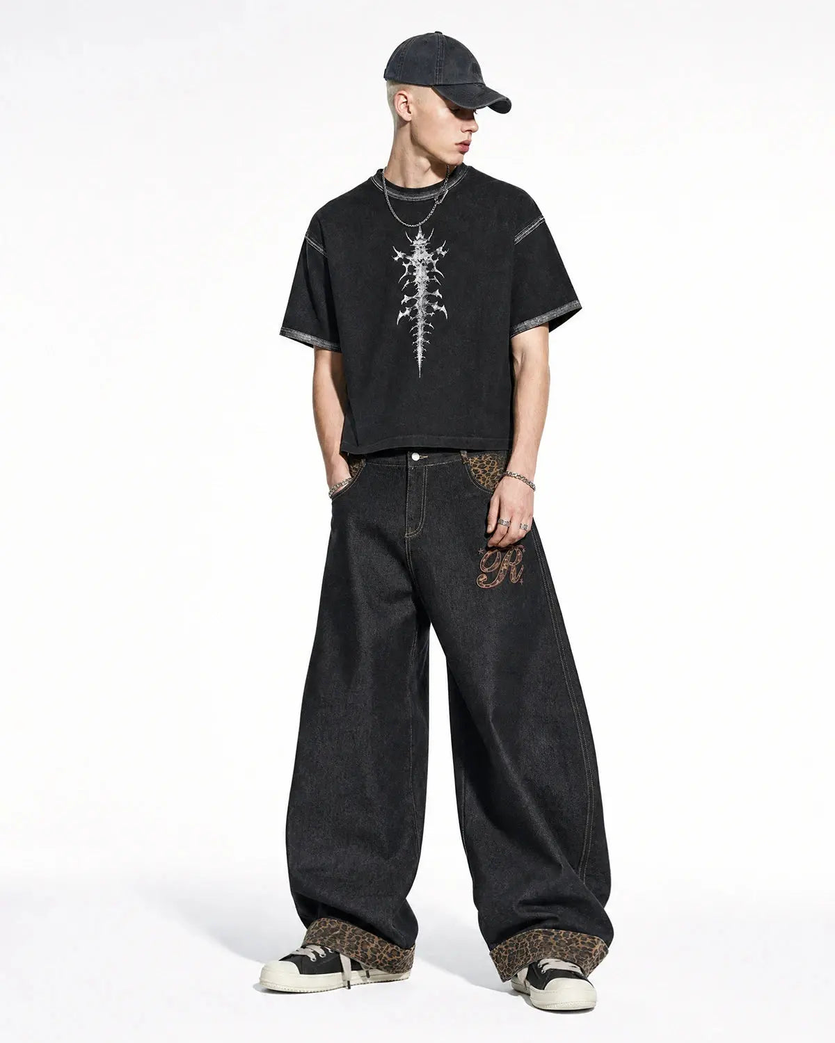 Leopard patchwork embroidery baggy jeans by INFLATION, featuring distressed details and relaxed streetwear style.
