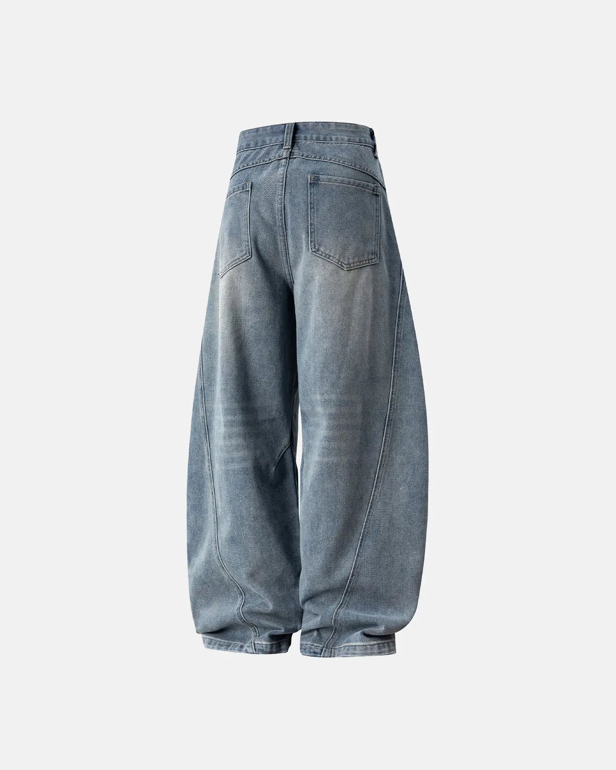 Curved seam deconstructed barrel jeans by Inflation Streetwear, showing distressed denim with a unique curved seam design.