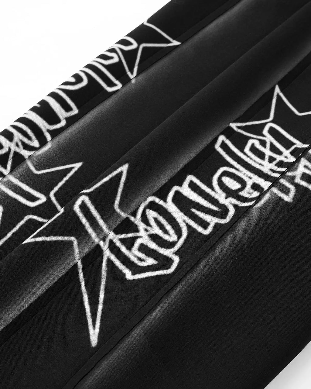 Inflation Streetwear graffiti sweatpants with hand-stitched spray paint design, relaxed fit, and casual streetwear style.